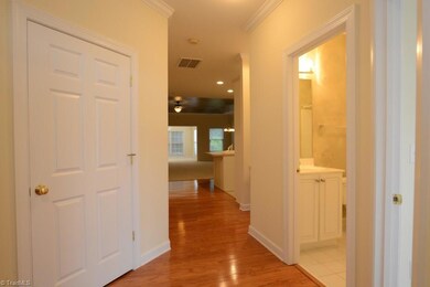Once entering from the front door, there are bedrooms to the left and right, with a coat closet and guest bath to welcome you or your guests home.