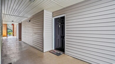 Entrance to property with covered porch