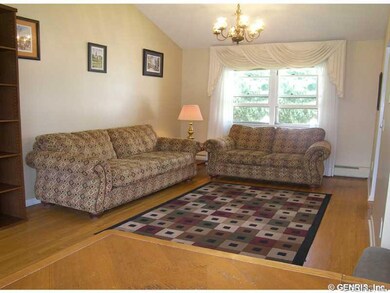 Living Room. Cathedral ceiling and hardwood floors