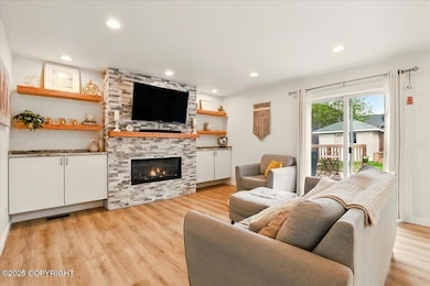 Living Room w/ Custom Fireplace