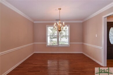 Separate formal dining - crown & chair moldings.  
