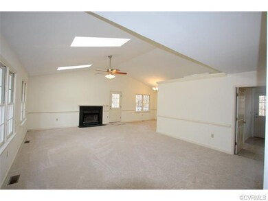 The open, spacious Living Room with a vaulted ceil