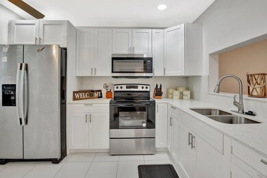 1200 SW 124th Terrace unit 404O, Pembroke Pines, FL 33027 - photo 2