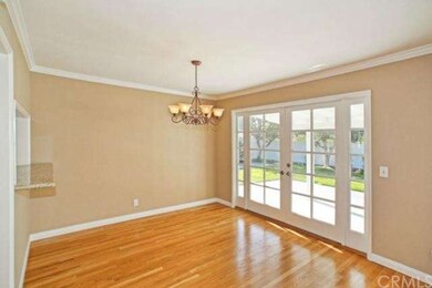 Dining Room with double doors to the backyard.