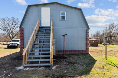 Stairs to the storage area above garage