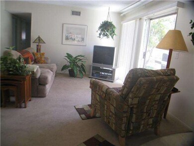 Light and bright family room with slider access to