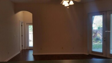 View of Family Room from the Kitchen and the 4th Bedroom and 3rd bath are to the left with own door to back.