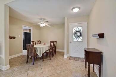 Formal Dining open to the foyer and family Room.