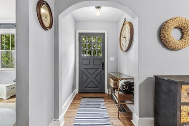 Foyer featuring hardwood / wood-style floors and a