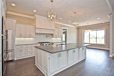 What a great floorplan! Kitchen has massive island
