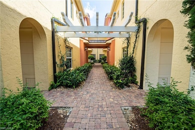 Entrance to property featuring a pergola