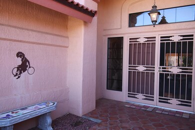 6. Front Patio with Screened Double Door