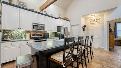 The large breakfast bar is a great place to gather