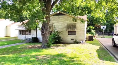 View of property featuring mature tree for ideal s