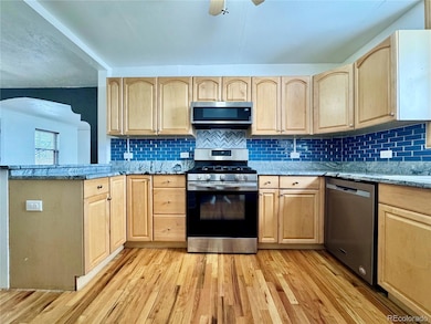 1648 Winona Ct unit 1, Denver, CO 80204 - photo 2