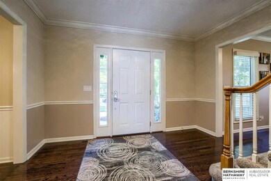 Wood floors on main level except for Laundry and 1/2 bath.