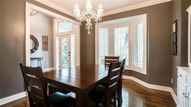 Formal Dining room features bay window, crown moul