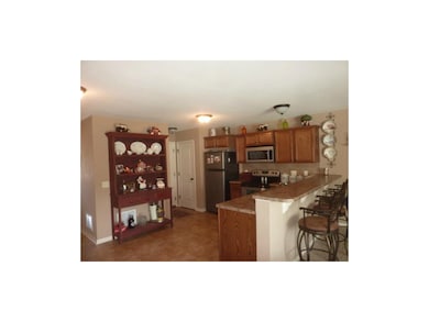 Large kitchen with stainless appliances
