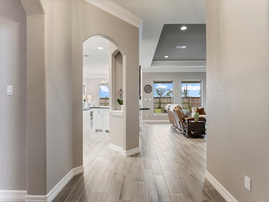 As you enter, the impressive foyer reveals the woo