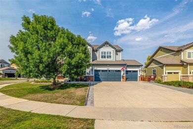 Three car garage with an expansive driveway.