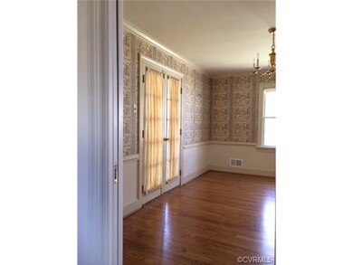 Dining room with French doors to side porch