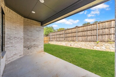 Fenced backyard featuring a patio area