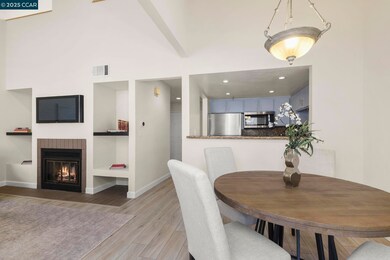 Easy access to kitchen and balcony for indoor or outdoor dining.