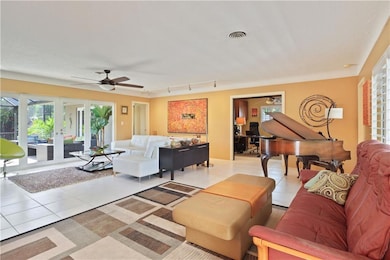Open floor plan reveals the pool and backyard with lots of light.