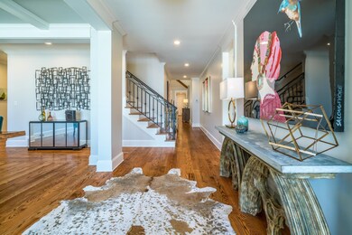 Step right in to the inviting foyer and open space