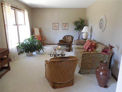 Formal living room faces south for beautiful natur