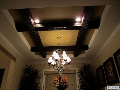 Custom wood beams in formal dining room.