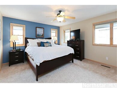 Roomy Owners' Suite with walk-in closet and...