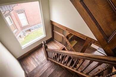 Staircase going to apartments 2,3, and 4 located o
