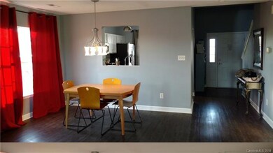 Dining Area with view toward kitchen & foyer. Note