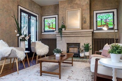 Gas fireplace with stained glass windows featured 