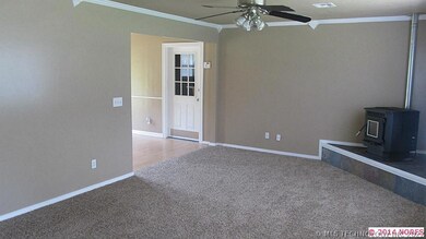 large living room with new paint, an new carpet
