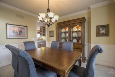 Formal dining room right off kitchen.