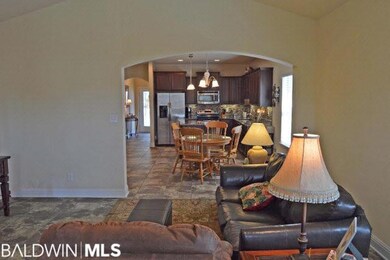 Foyer opens to a study on your right and open kitc