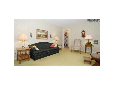 Great room viewed from foyer toward bedroom & bath