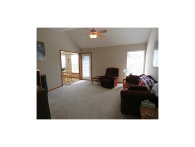 Large living room with access to back yard.
