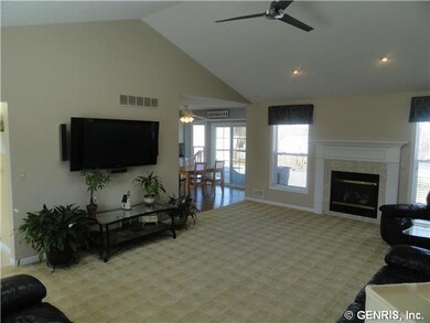 Great Room. 3 rd view.  Large arch to kitchen dine