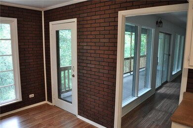Dining Room View of Patio Access and Living Room A