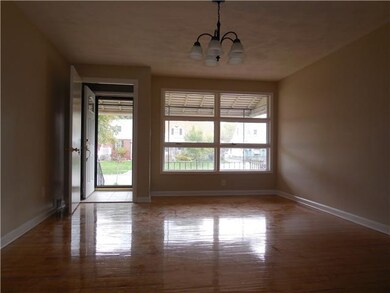 Living Room NEW FRONT DOOR WELCOMES YOU INTO THE H