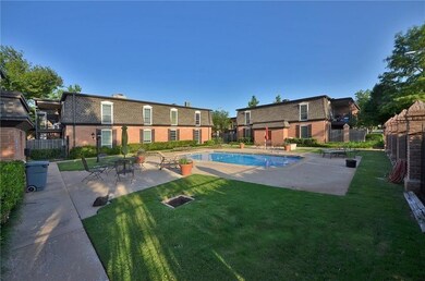 View of swimming pool featuring a yard and a patio