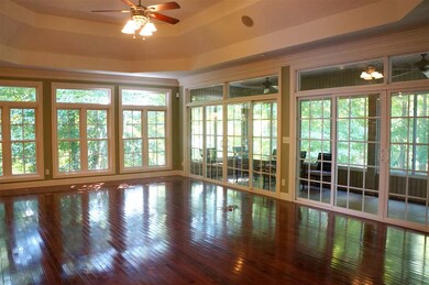 This room is wide open and contains the kitchen, f
