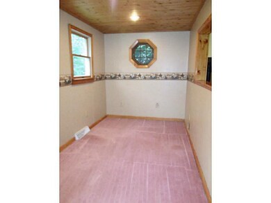 Den. Den or sitting room from the front door with 