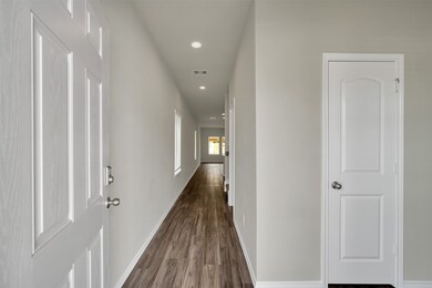 Vinyl plank flooring is throughout the living area on the first floor.  There is a lot of storage throughout the home, too.