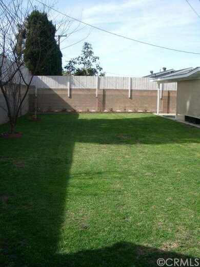Huge backyard with raised fence on all sides. Plen