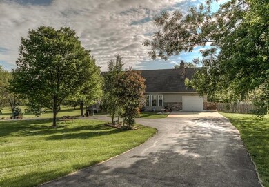 909 N Washington St, Raymore, MO 64083 - photo 2