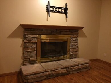 The stone fireplace is a work of art, the signatur